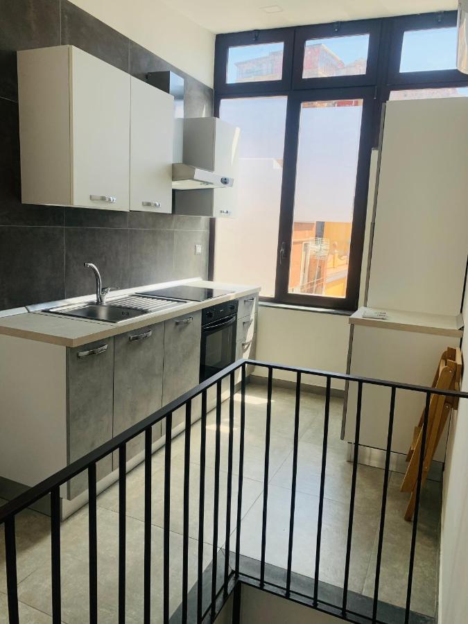 Center Living Apartment Катания Экстерьер фото
